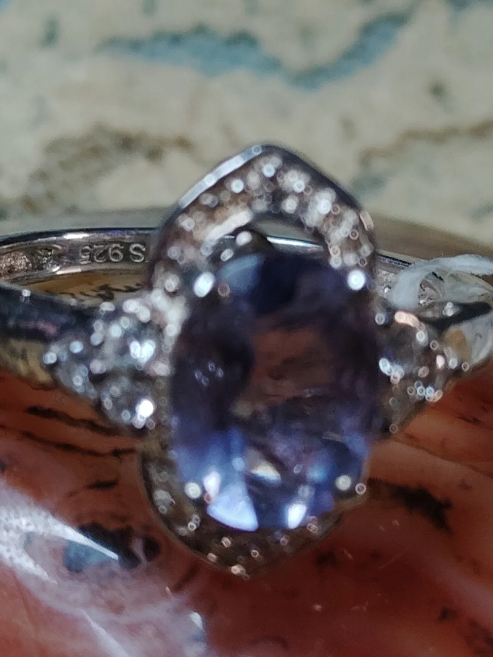 FLUORITE OVAL GEMSTONE AND SPARKLING ACCENTS OF MACASITE. STERLING RING. SIZE 5